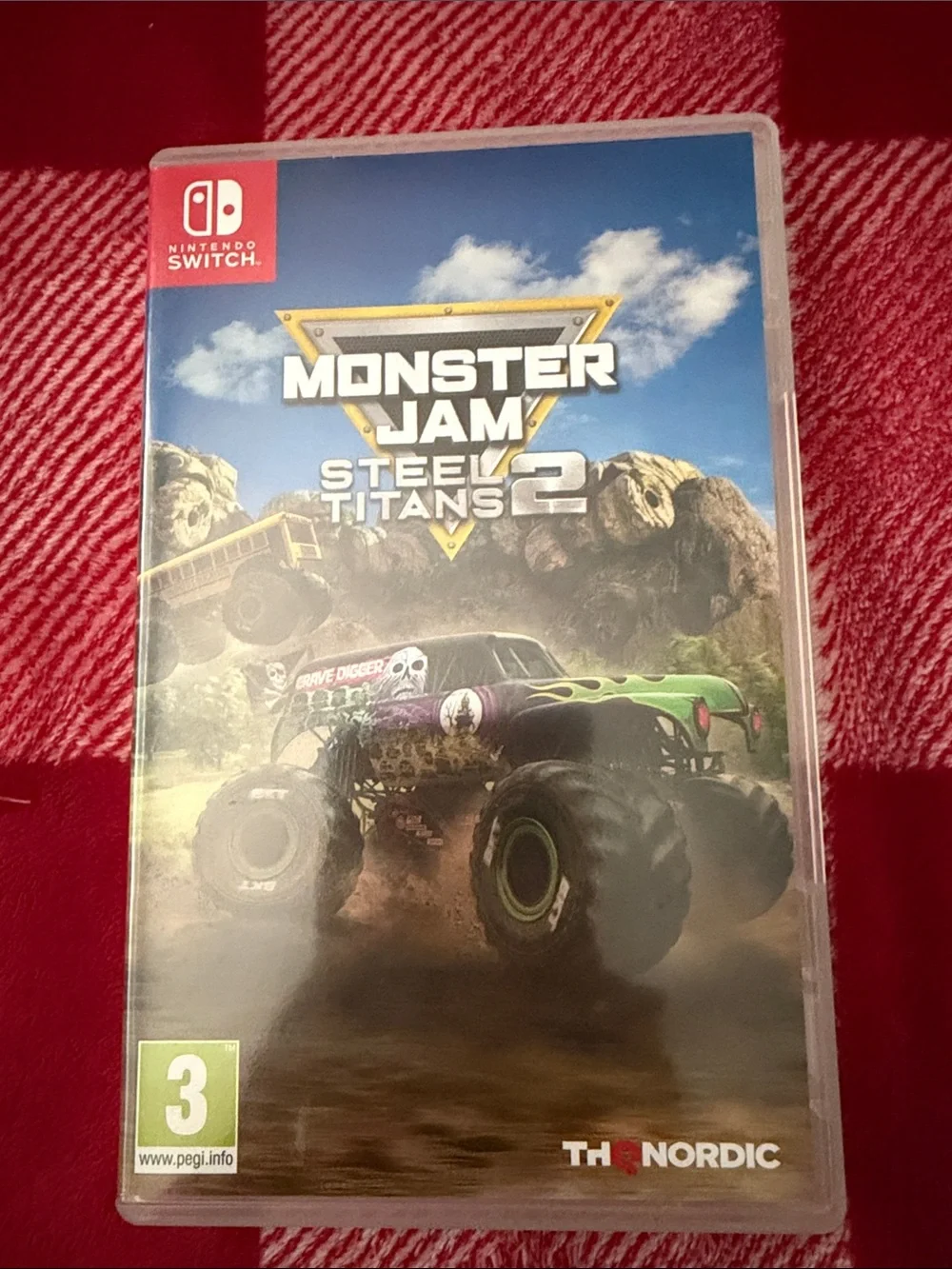 Nintendo Switch Monster Jam Steel Titans 2 – Blue & Green Cover